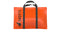 portable SKOTTI gas grill in orange tarp bag
